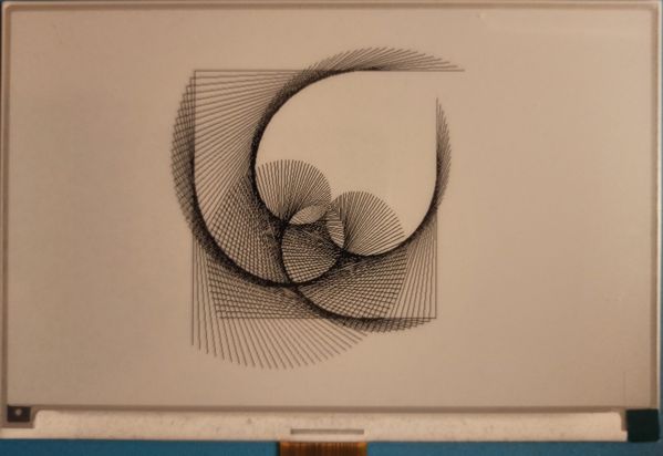 An e-ink display showing curves coming out of straight lines in a square frame.